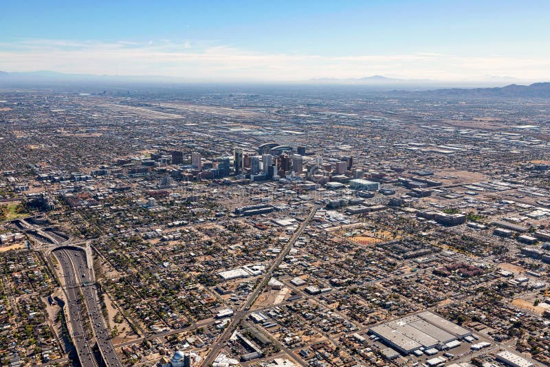 Phoenix, Arizona from above with Internal Airport in the distance stock photos Phoenix, Arizona from above with Internal Airport in the distance stock photos
