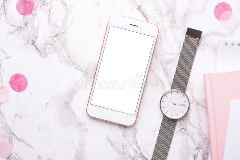 Phone with a clock on a marble background in the office royalty free stock photography Phone with a clock on a marble background in the office royalty free stock photography
