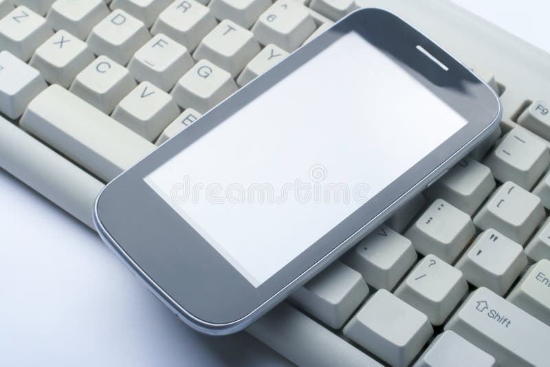 Phone on computer keyboard royalty free stock image Phone on computer keyboard royalty free stock image