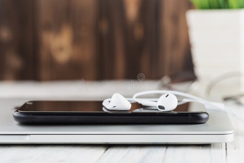 Phone and Headphone Stack on Laptop Front View Stock Image Image of