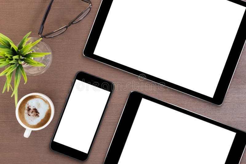 Phone and tablet blank screen on table top view