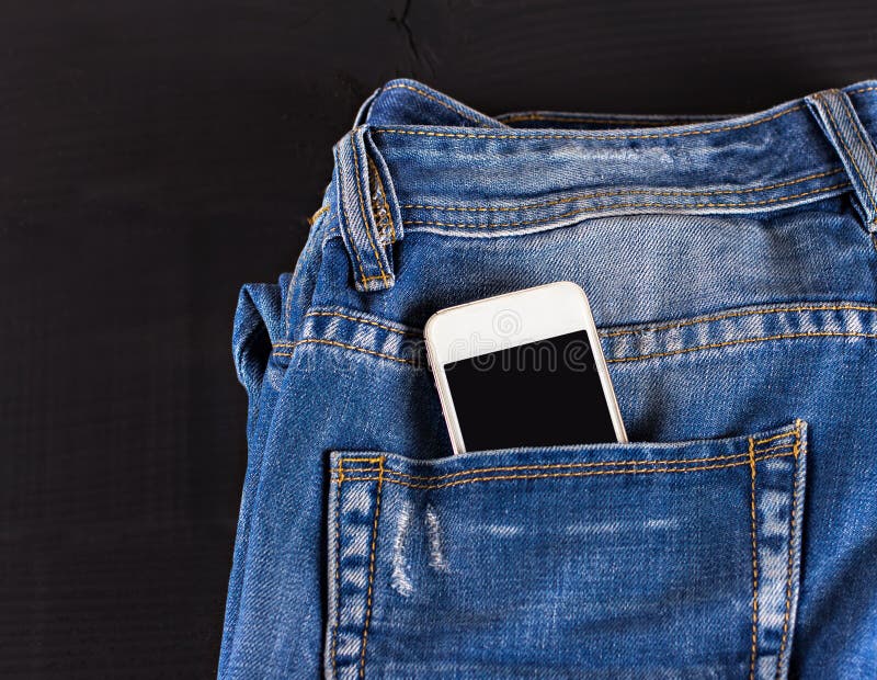 Phone in your pocket jeans stock image. Image of communication - 83315111