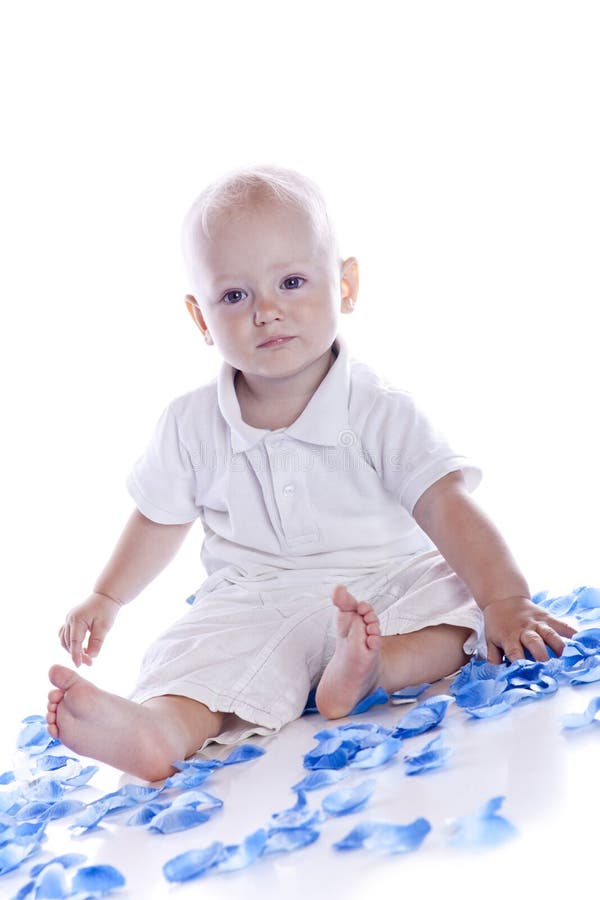 Photo of adorable young boy on white background