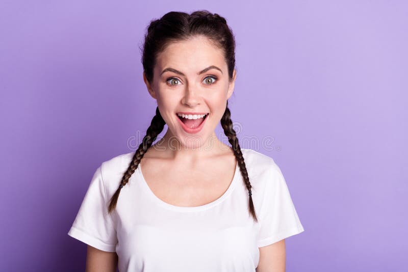 Photo of amazed happy cheerful young woman shock sale news good mood isolated on violet color background