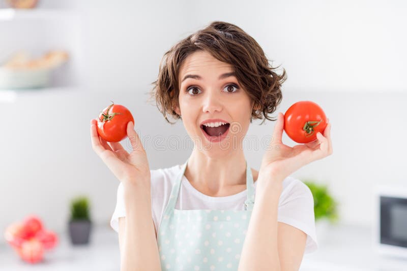 Photo Of Attractive Funny House Wife Lady Arms Holding Two Big Tomato Playful Mood Enjoy Morning 