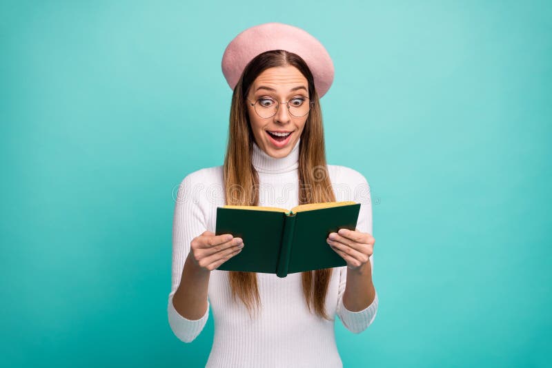 Photo of attractive lady student hold love story book novel interesting plot open mouth unexpected final wear specs stock photo