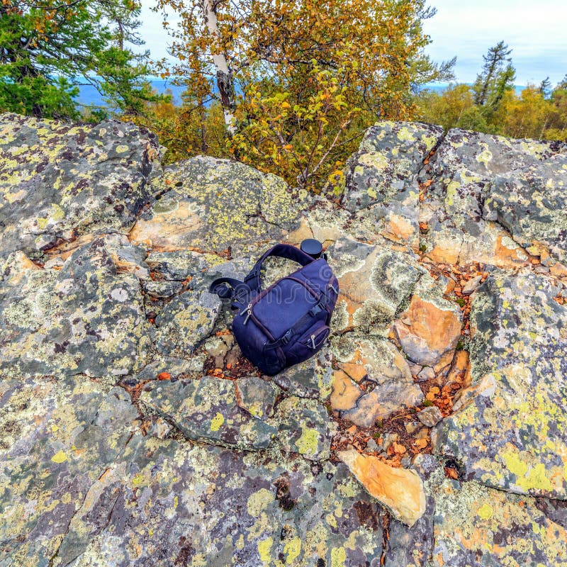 Photo Backpack Lying on a Rock Stock Image Image of black, natural