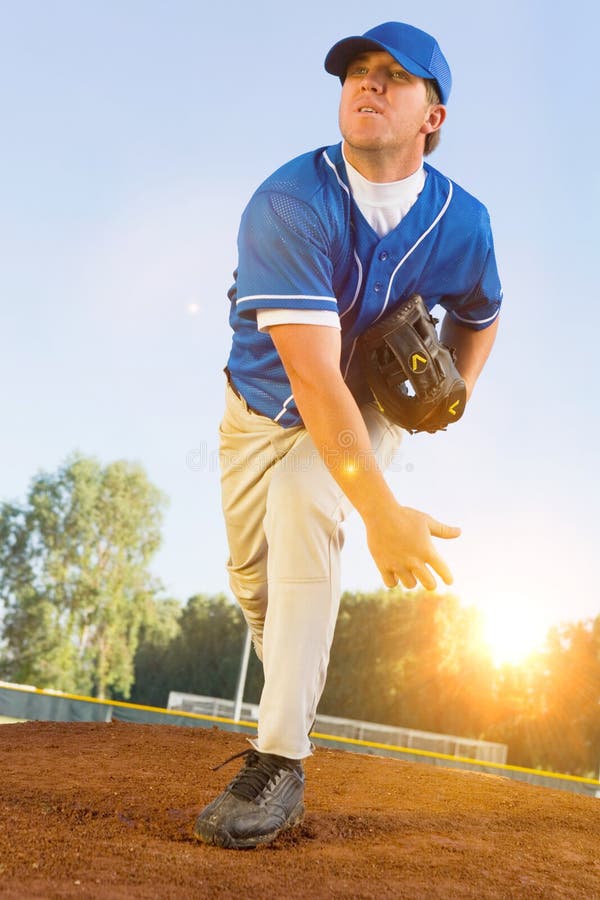 Baseball Pitcher Holding Glove in Front of Face Stock Photo Image of