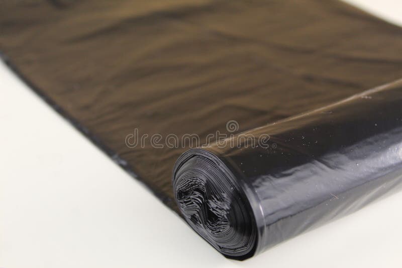 Black bin liner rolled out stock photo. Image of pollution 297748580