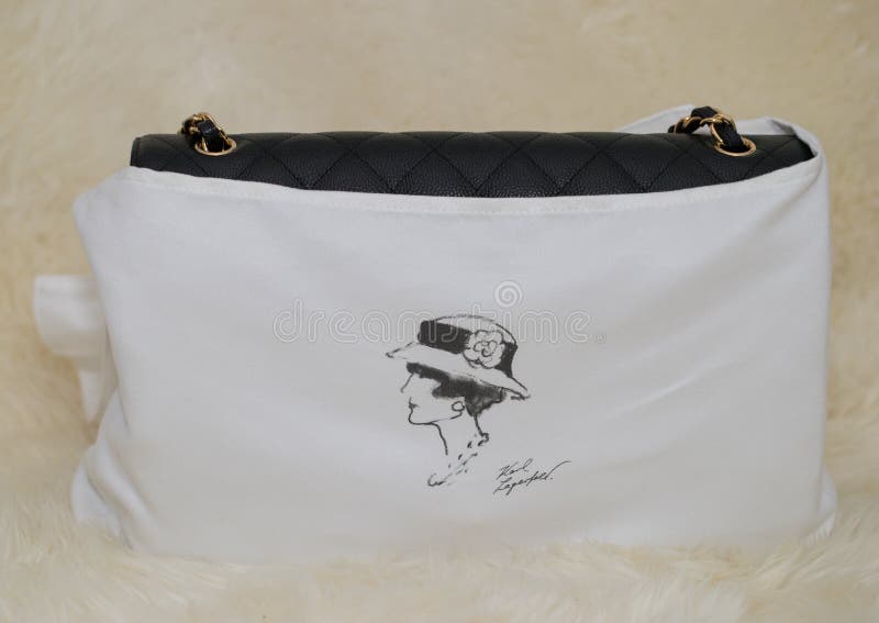 Photo of Black Chanel Dust Bag Brand Editorial on White Background.  Editorial Photo - Image of italy, collection: 123477606