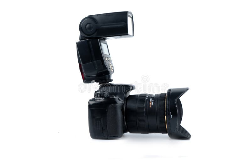 Photo camera and flash isolated on a white background. Copy space stock photos