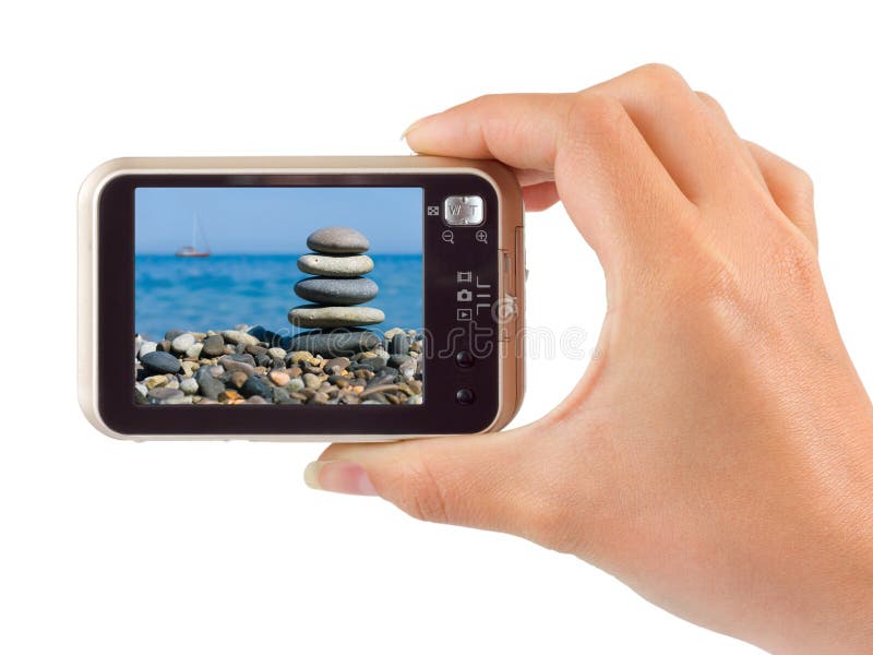 Photo camera in hand stock image Photo camera in hand stock image