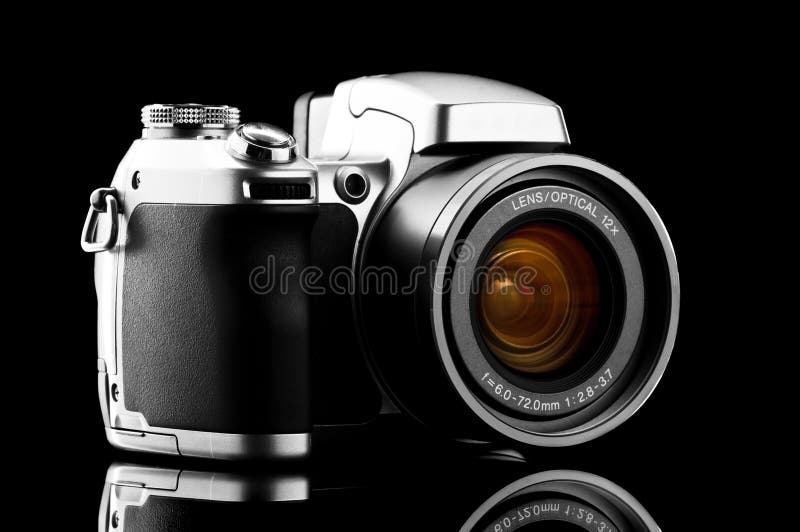 Photo camera isolated on black