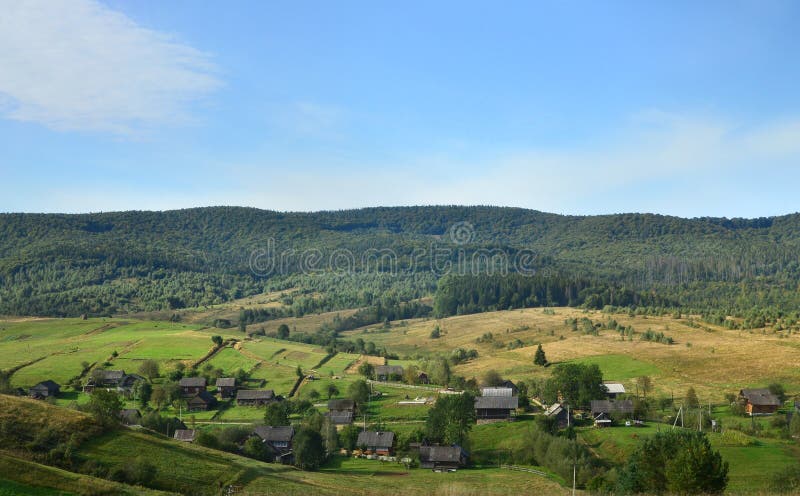 Photo of the Carpathian Mountains, which have a lot of coniferous trees. Forest and mountain landscape in the early autumn season royalty free stock image Photo of the Carpathian Mountains, which have a lot of coniferous trees. Forest and mountain landscape in the early autumn season royalty free stock image