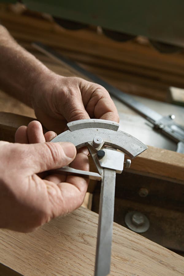 Carpenter Adjusting the Blade on a Circular Saw Stock Photo Image of