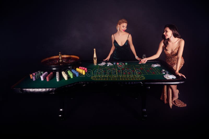 Photo of attractive chic celebrate bachelorette event in night las vegas party playing lucky win million jackpot. Photo of attractive chic celebrate bachelorette event in night las vegas party playing lucky win million jackpot.