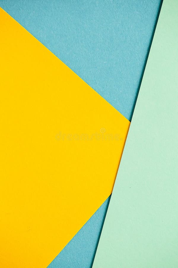 Photo of colored sheets of paper: yellow, orange, blue and green. Suitable for design templates, covers, banners stock photo Photo of colored sheets of paper: yellow, orange, blue and green. Suitable for design templates, covers, banners stock photo
