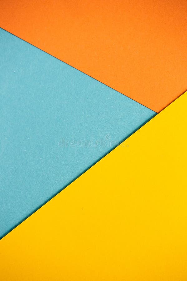 Photo of colored sheets of paper: yellow, orange, blue, green. Suitable for design templates, covers, banners, reports stock photography Photo of colored sheets of paper: yellow, orange, blue, green. Suitable for design templates, covers, banners, reports stock photography