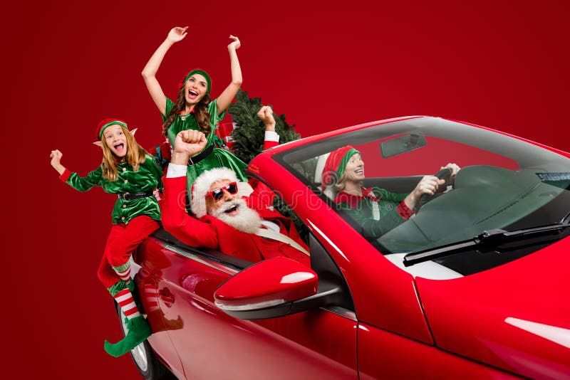 Photo of crazy stylish people prepare x-mas ride car deliver presents wear costume  white color background royalty free stock image