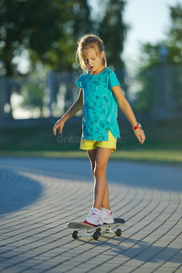 Photo of cute little girl with skateboard royalty free stock photos Photo of cute little girl with skateboard royalty free stock photos