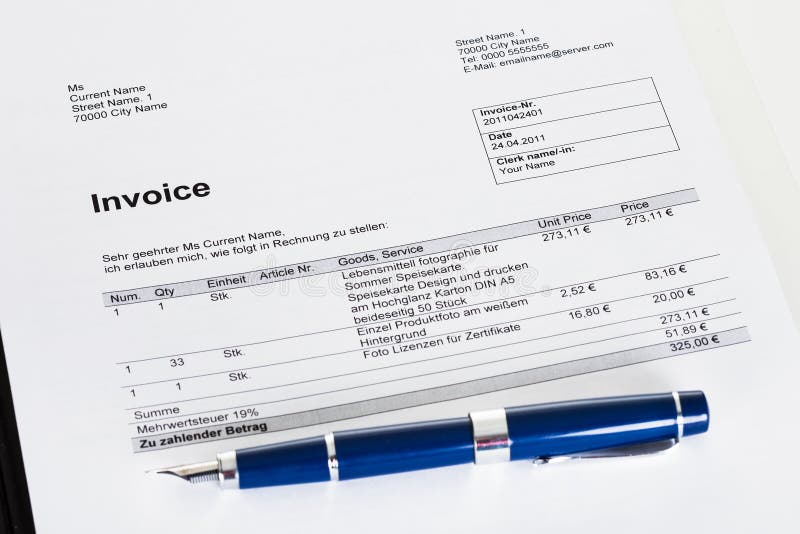 Photo of invoice paper document and pen. Photo of invoice paper document and pen