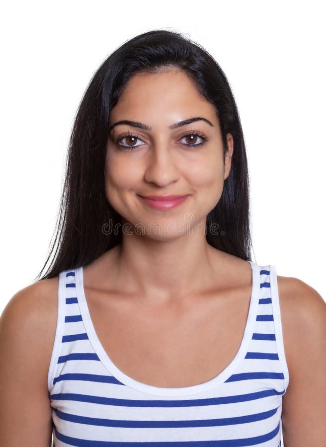 Passport picture of a smiling turkish woman in a striped shirt on an isolated white background for cut out. Passport picture of a smiling turkish woman in a striped shirt on an isolated white background for cut out