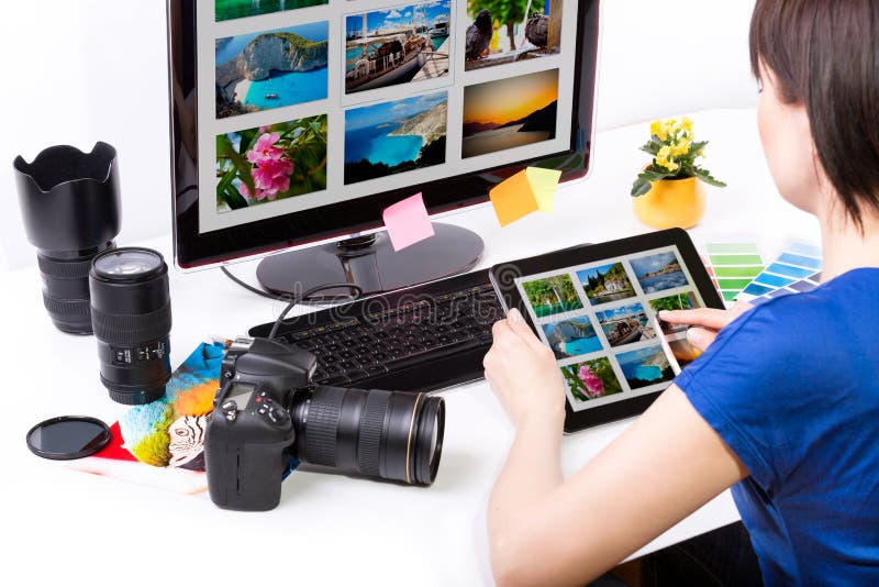 Photo editor working on computer and used graphics tablet. Computer editing stock images, royalty-free photos and pictures