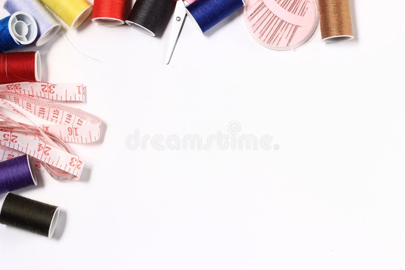 Flat lay or top view, needle, scissor, thread, tailor Meter, at white Background stock photography