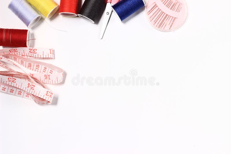 Flat lay or top view, needle, scissor, thread, tailor Meter, at white Background royalty free stock images