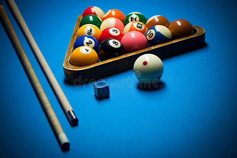 Photo fragment of the blue pool billiard game with cue. Pool billiard game. Billiard sport concept.play cue and