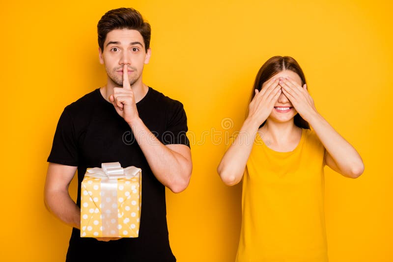 Photo of funny cute couple of two spouses with guy showing you shh sign to stop talking and girl covered in anticipation