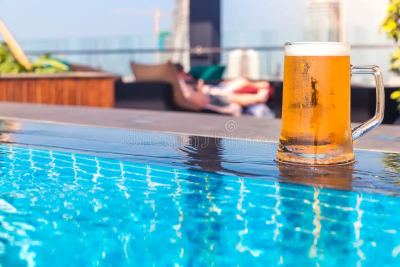A Glass of Beer on a Sunny Day by the Pool Stock Image Image of pint
