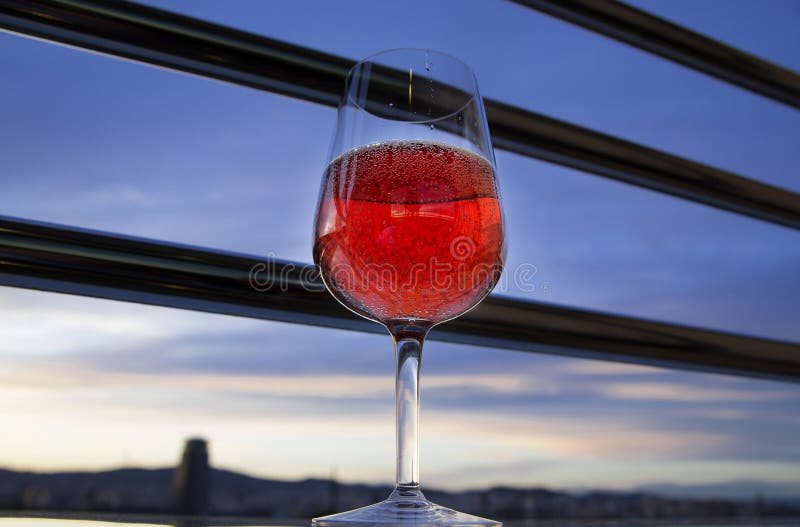 A Glass of Red Wine on the Balcony in the Evening Stock Image Image