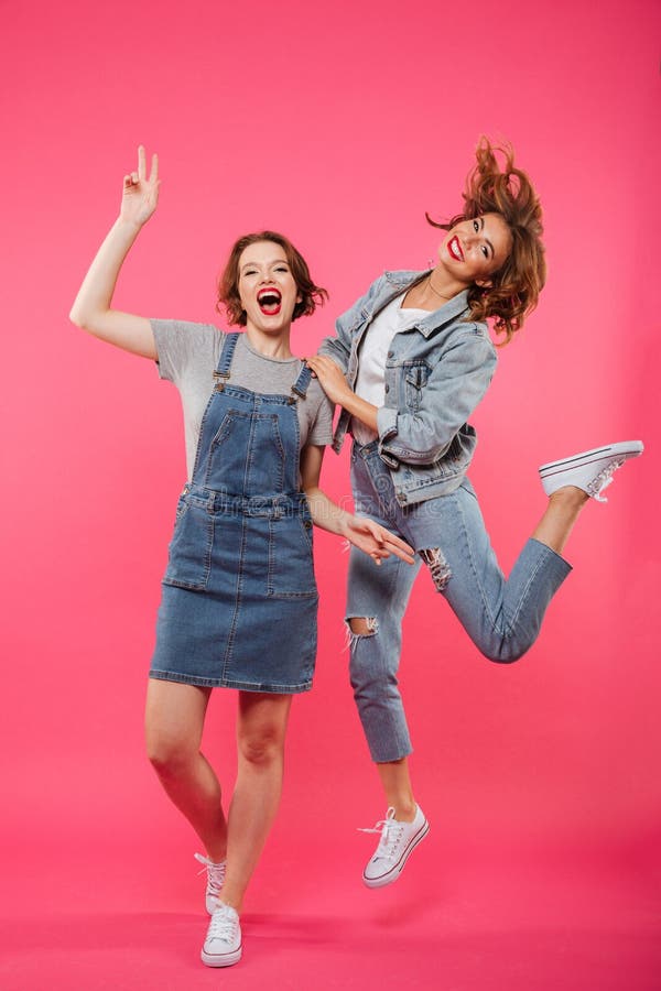 Happy two women friends isolated stock photos Happy two women friends isolated stock photos
