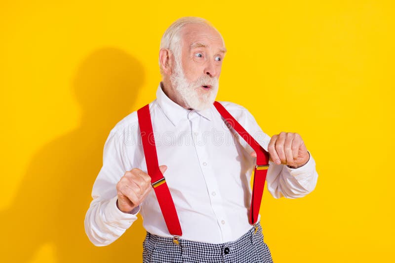 Photo of Hooray Aged Man Look Promo Wear White Shirt Red Suspenders  Isolated on Yellow Color Background Stock Photo - Image of feelyoung, outfit:  235879930