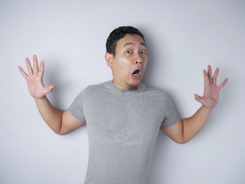 Young Man Afraid with Arms Raise Up, Surrender Gesture Stock Image - Image  of afraid, hand: 160670931