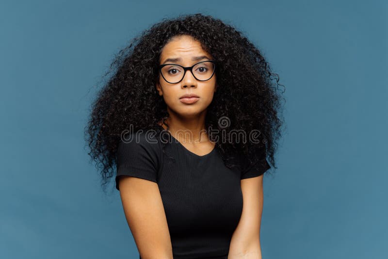 Bushy girl poses for camera