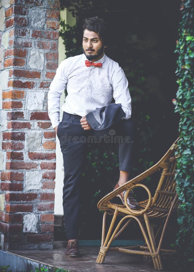 Photo Of Man In White Shirt And Black Pants Picture. Image 111545724