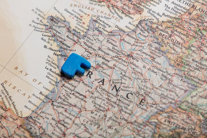 photo of map of France and blue letter on the wonderful background