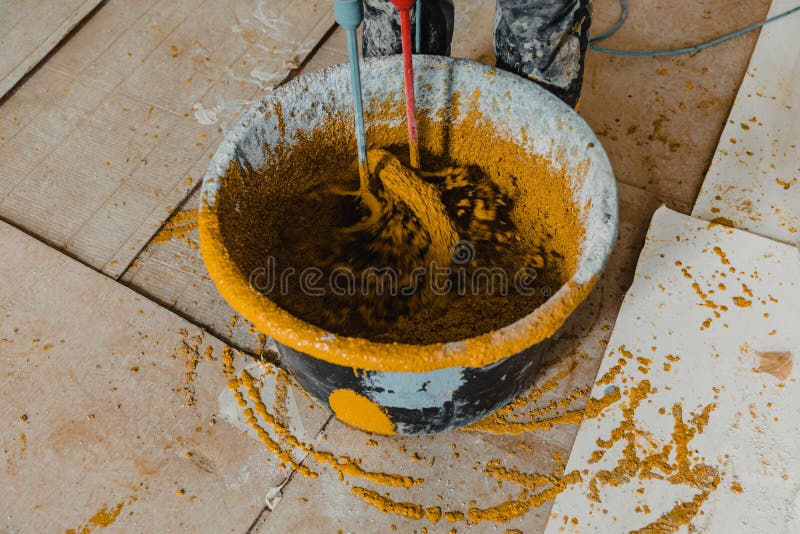 Worker Mixing Yellow Epoxy Resin with the Mixer Stock Image - Image of  floor, resin: 201816033