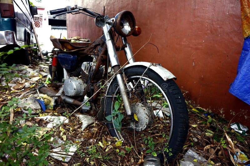 Old, Broken and Rusty Motorcycle at an Empty Lot Stock Image Image of