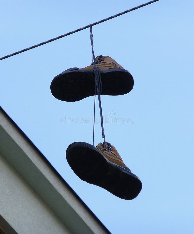 Pair of Brown Shoes Hanging on the Wire Stock Image Image of shoe, brown 107323329