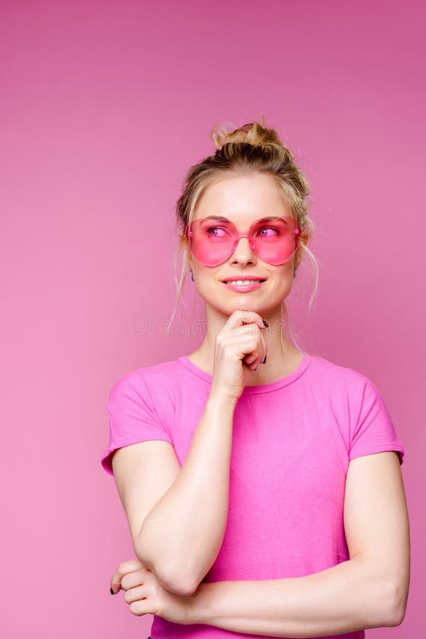 Woman With Large Breasts Posing In Pink Shirt Stock Photo, Picture and  Royalty Free Image. Image 97370863.