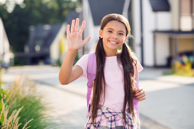 Photo Portrait of Little Girl Waving Hand Saying Hello Wearing Rucksack ...