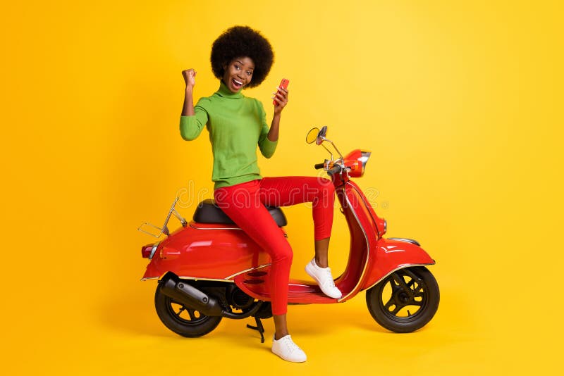 Photo Portrait of Young Brunette African American Biker on Red Bike ...