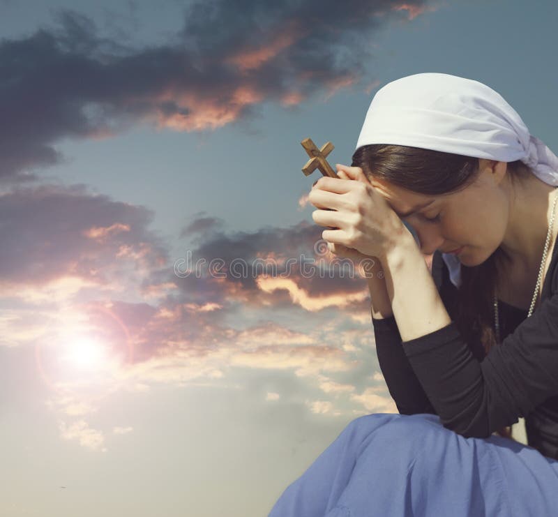 Photo of praying woman