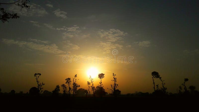 Photo of the rising Sun in india gujrat vilej rural aria. Photo of the rising Sun in india gujrat vilej rural aria