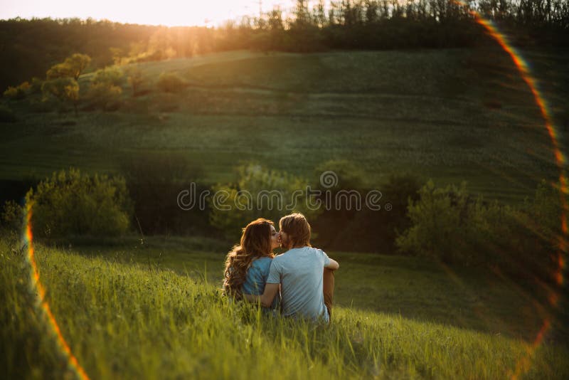 Young Couple Watching the Sun Stock Photo - Image of beautiful, person ...