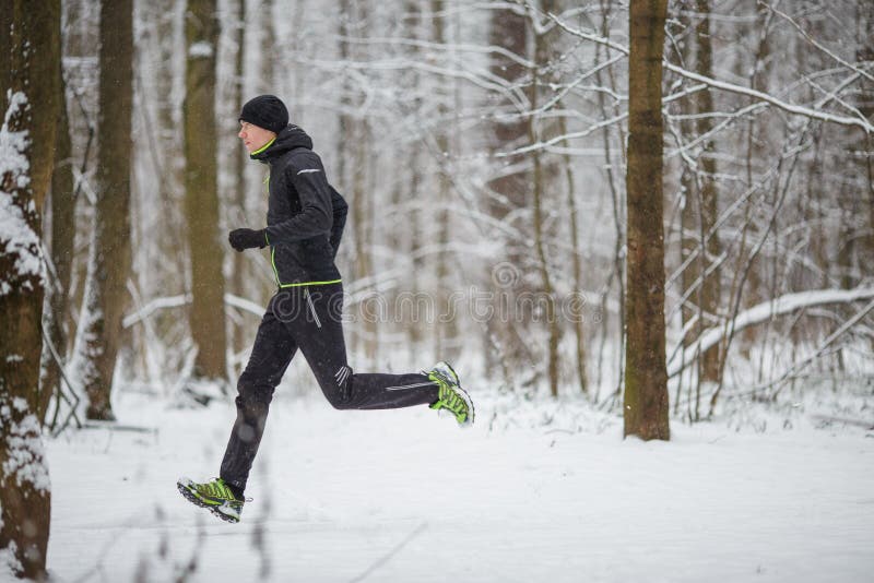 Photo from Side of Man in Sports Clothes on Run in Winter Stock Image -  Image of park, athletic: 108188221