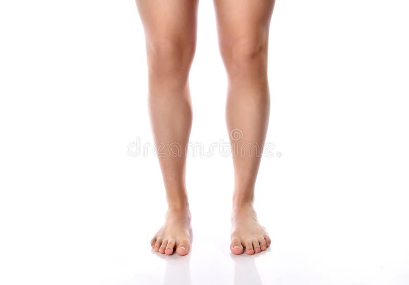 Photo Of Smooth Shaved Legs And Feet Isolated On White Stock Image